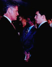 US President Bill Clinton, congratulates Eric Malone after a ceremony honoring his heroic rescue efforts during the '96 Floods in the State of Pennsylvania. Eric is presented with a Commendation from the White House.